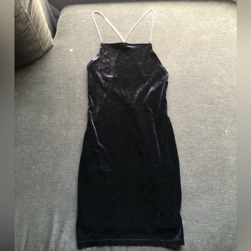 Black mini dress with Diamond straps.